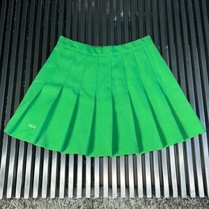 Bright Green Tennis Skrit size 10 on the label PRICE IS FIRM